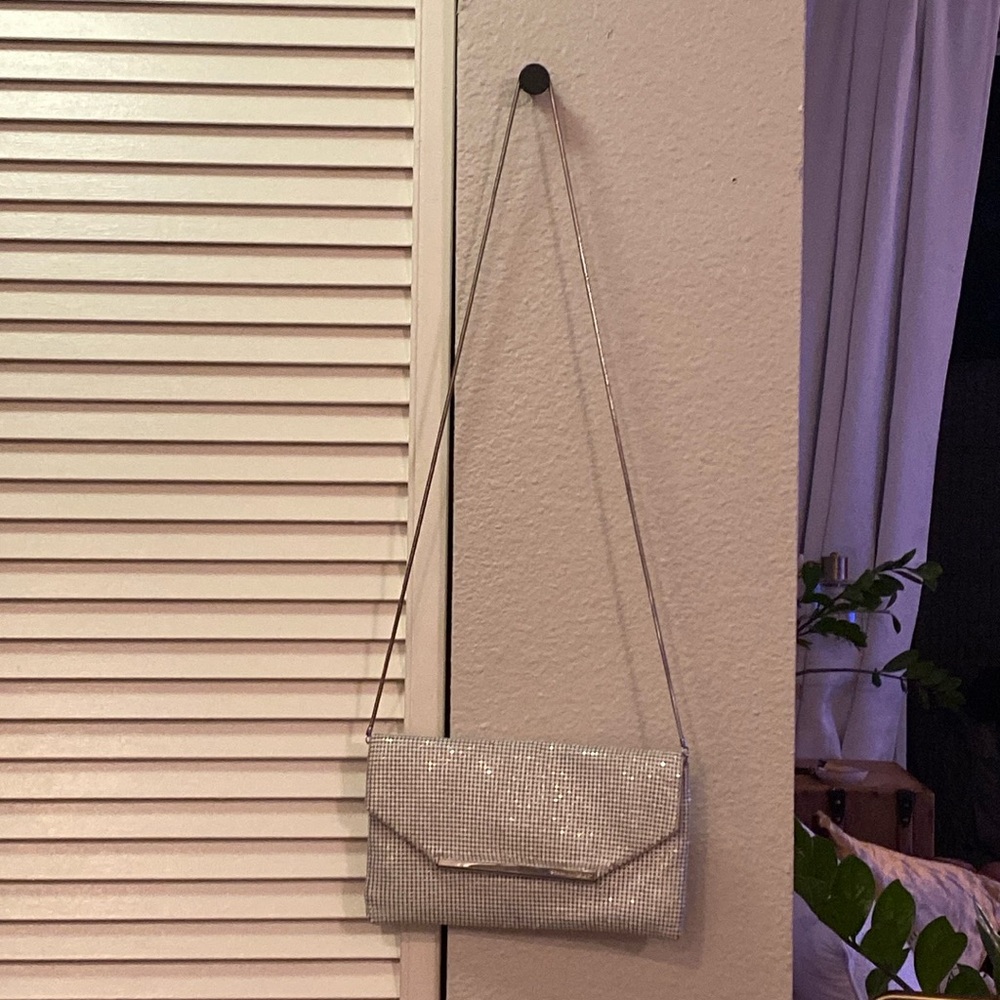 Bcbg white sequined small cross body purse.